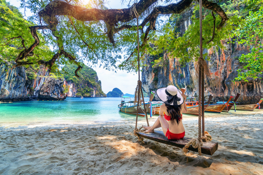 woman-bikini-relaxing-swing-ko-lao-lading-island-krabi-thailand